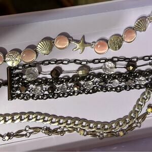 Lot of 4 bracelets, all wearable and in great condition.